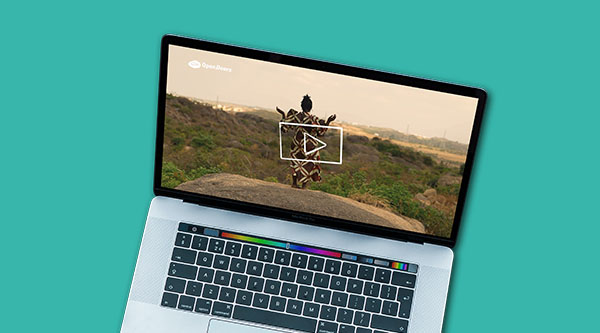 Mockup eines Laptops. Auf dem DIsplay ist ein Video zu Arise Africa zu sehen.