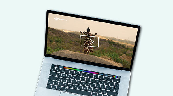 Mockup eines Laptops. Auf dem DIsplay ist ein Video zu Arise Africa zu sehen.