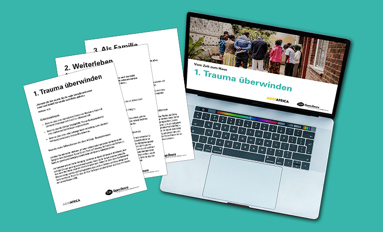 Produktabbildung Downloadmaterial vor einem Laptop