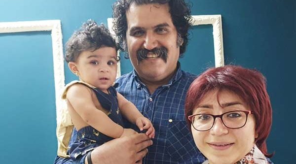 Sam Khosravi und seine Frau Maryam Falah mit der kleinen Lydia auf dem Arm