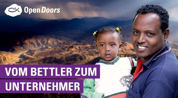 Khalid aus Äthiopien mit seiner Tochter auf dem Arm